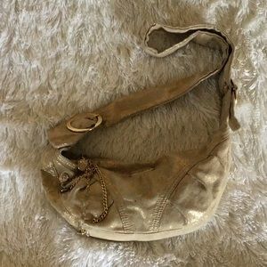 Applebottoms gold hand bag